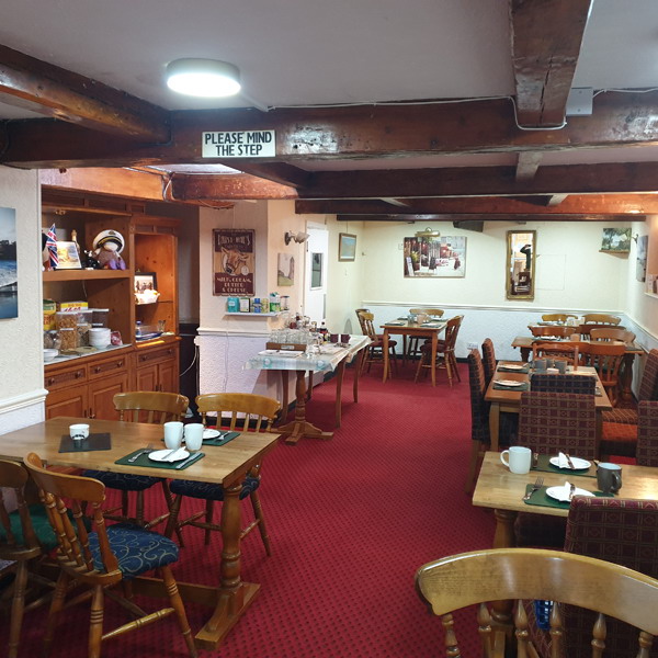 The beamed breakfast dining room