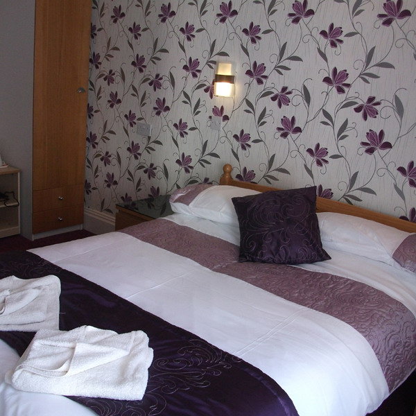 Comfortable double bedroom at Blands Cliff Lodge